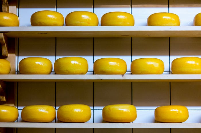 Packaged round cheese on the shelf